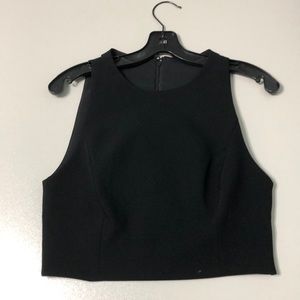 Black crop top with cutouts in the back.